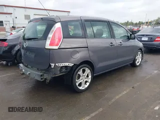 2010 Mazda 5 Sport with VIN JM1CR2WL8A0374230, listed as a IAAI auction lot 41956562 with 240,354 mi miles. Bid and sale history available at carsss.com. Image 4.