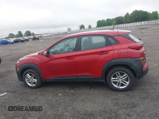 2021 Hyundai Kona SE z VIN KM8K1CAA4MU633934, wystawiony jako IAAI lot #42157313 z przebiegiem 87 714 mil mil oraz . Historia ofert i sprzedaży dostępna na DreamBid. Obrazek 14.