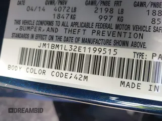 2014 Mazda 3 S Touring with VIN JM1BM1L32E1199515, listed as a IAAI auction lot 41783271 with 152,443 mi miles and . Bid and sale history available at DreamBid. Image 9.