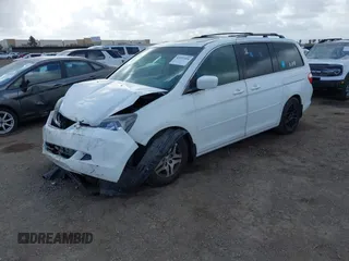 2006 Honda Odyssey EX-L z VIN 5FNRL38766B452806, wystawiony jako IAAI lot #41931830 z przebiegiem 133 822 mil mil oraz . Historia ofert i sprzedaży dostępna na DreamBid. Obrazek 2.
