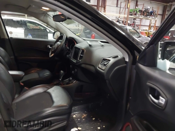 2019 Jeep Compass Trailhawk with VIN 3C4NJDDB2KT649889, listed as a IAAI auction lot 41562599 with 70,700 mi miles and . Bid and sale history available at carsss.com. Image 5.