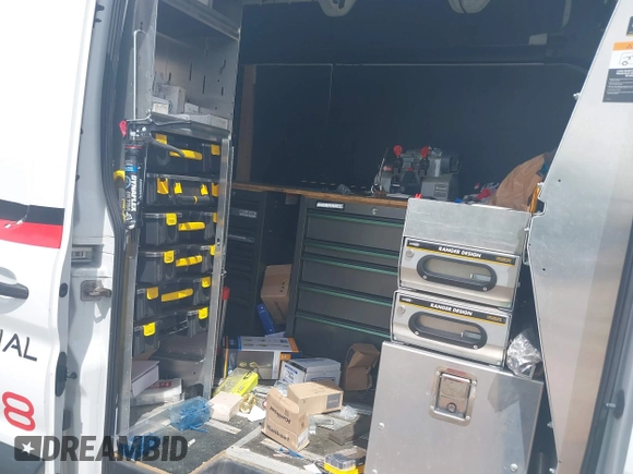 2019 Ford Transit with VIN 1FTYR2XG0KKA22854, listed as a IAAI auction lot 42245141 with 157,886 mi miles and . Bid and sale history available at DreamBid. Image 8.