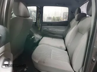 2014 Toyota Tacoma with VIN 5TFLU4ENXEX089927, listed as a Copart auction lot 52140565 with 112,924 mi miles and Salvage Title. Bid and sale history available at DreamBid. Image 10.
