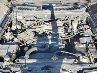 1997 Toyota 4Runner SR5 z VIN JT3HN86RXV0100711, wystawiony jako Copart lot #56483995 z przebiegiem 184 667 mil mil oraz Szkoda całkowita • Salvage title. Historia ofert i sprzedaży dostępna na DreamBid. Obrazek 12.