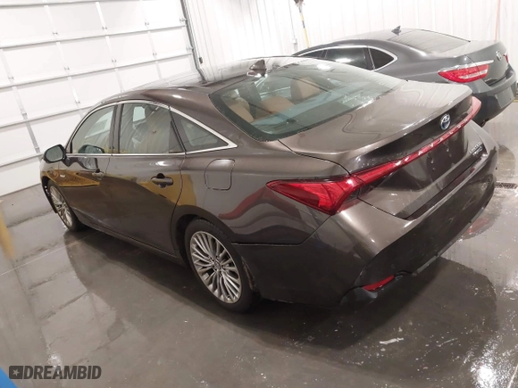 2019 Toyota Avalon Hybrid Limited with VIN 4T1B21FB3KU007114, listed as a IAAI auction lot 41658316 with 127,785 mi miles. Bid and sale history available at carsss.com. Image 3.