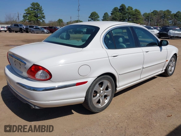 2002 Jaguar X-Type with VIN SAJEA51C22WC27350, listed as a IAAI auction lot 41778528 with 163,600 mi miles and . Bid and sale history available at DreamBid. Image 4.