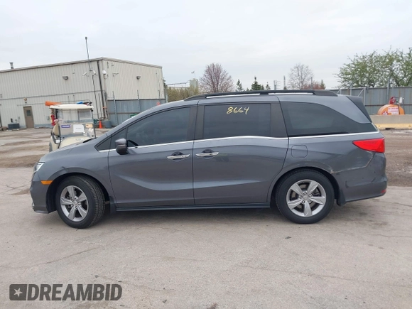 2018 Honda Odyssey EX-L with VIN 5FNRL6H72JB076597, listed as a IAAI auction lot 41838664 with 154,647 mi miles and . Bid and sale history available at DreamBid. Image 14.