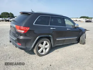 2011 Jeep Grand Cherokee Overland Summit with VIN 1J4RR6GT3BC686143, listed as a Copart auction lot 59218685 with 155,059 mi miles and Salvage title. Bid and sale history available at DreamBid. Image 3.