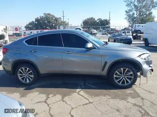 2015 BMW X6 xDrive50i with VIN 5UXKU6C52F0F94060, listed as a IAAI auction lot 41299202 with 67,835 mi miles. Bid and sale history available at carsss.com. Image 13.