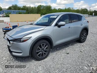 2018 Mazda CX-5 Grand Touring z VIN JM3KFBDM1J0318492, wystawiony jako Copart lot #56943725 z przebiegiem 72 479 mil mil oraz Szkody całkowita. Historia ofert i sprzedaży dostępna na DreamBid. Obrazek 1.