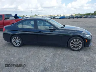 2018 BMW 3 Series 320i with VIN WBA8E1G57JNU88781, listed as a IAAI auction lot 42019246 with 56,820 mi miles. Bid and sale history available at carsss.com. Image 14.