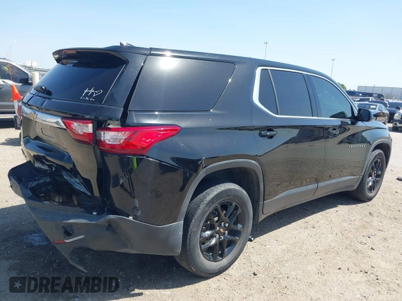 2019 Chevrolet Traverse LS with VIN 1GNERFKW1KJ310856, listed as a IAAI auction lot 41806247 with 88,501 mi miles. Bid and sale history available at carsss.com. Image 4.