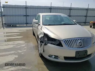 2012 Buick LaCrosse Leather z VIN 1G4GC5E30CF138060, wystawiony jako Copart lot #51160135 z przebiegiem 118 056 mil mil oraz Szkoda całkowita • Salvage title. Historia ofert i sprzedaży dostępna na DreamBid. Obrazek 13.