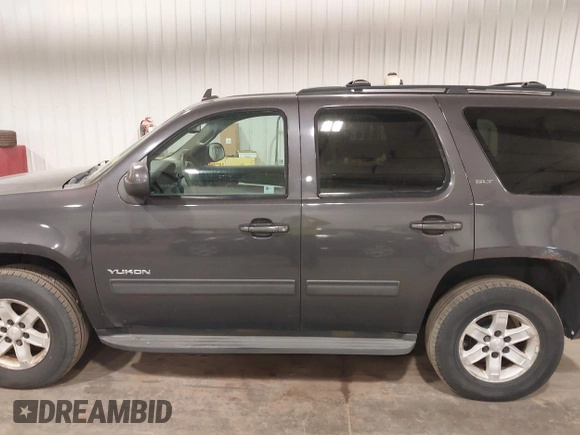 2010 GMC Yukon SLT with VIN 1GKUKCE08AR148548, listed as a IAAI auction lot 41994933 with 248,534 mi miles. Bid and sale history available at carsss.com. Image 14.