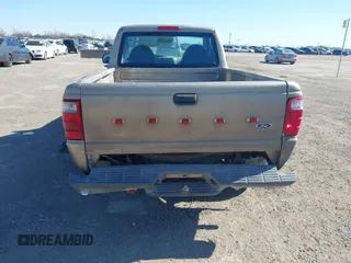2003 Ford Ranger XL with VIN 1FTYR10D43PB74179, listed as a IAAI auction lot 41697965 with 290,897 mi miles. Bid and sale history available at carsss.com. Image 6.