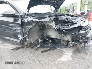2023 Volkswagen Jetta SE z VIN 3VW7M7BUXPM061694, wystawiony jako IAAI lot #42231342 z przebiegiem 39 063 mil mil oraz . Historia ofert i sprzedaży dostępna na DreamBid. Obrazek 6.