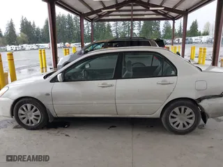 2006 Mitsubishi Lancer ES with VIN JA3AJ26E86U060513, listed as a IAAI auction lot 41980244 with 154,379 mi miles. Bid and sale history available at carsss.com. Image 14.