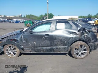 2023 Mazda CX-30 S Carbon Edition with VIN 3MVDMBCM6PM510231, listed as a IAAI auction lot 42579591 with 29,240 mi miles and . Bid and sale history available at DreamBid. Image 14.