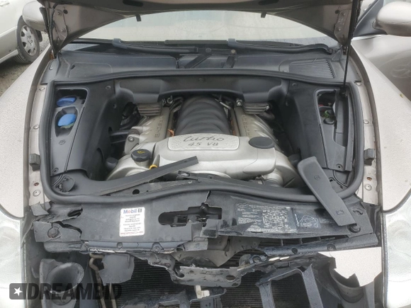2005 Porsche Cayenne Turbo z VIN WP1AC29P75LA90100, wystawiony jako Copart lot #74377104 z przebiegiem 209 034 mil mil oraz Szkoda całkowita • Salvage title. Historia ofert i sprzedaży dostępna na DreamBid. Obrazek 12.