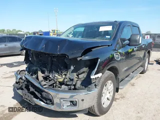 2017 Nissan Titan SV with VIN 1N6AA1E68HN535917, listed as a IAAI auction lot 41974261 with 162,561 mi miles and . Bid and sale history available at DreamBid. Image 18.