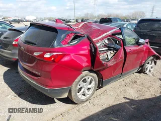 2021 Chevrolet Equinox Premier z VIN 2GNAXNEV7M6140889, wystawiony jako IAAI lot #42039443 z przebiegiem 101 767 mil mil oraz . Historia ofert i sprzedaży dostępna na DreamBid. Obrazek 4.