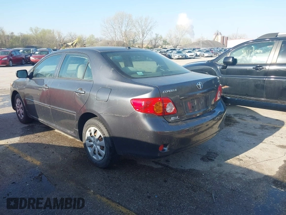 2009 Toyota Corolla with VIN JTDBL40E499083055, listed as a IAAI auction lot 41918173 with 223,308 mi miles. Bid and sale history available at carsss.com. Image 3.