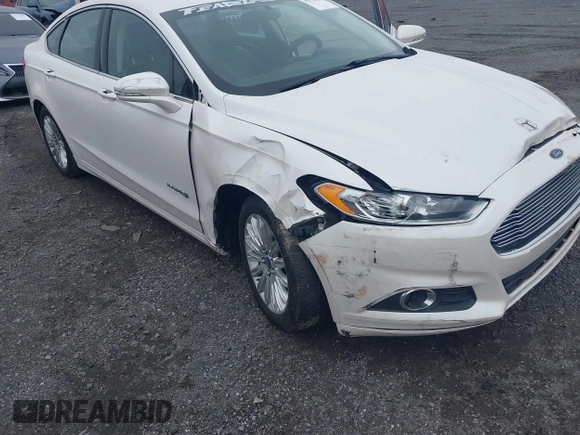 2014 Ford Fusion SE Hybrid с VIN 3FA6P0LUXER125766, выставлен на аукционе IAAI как лот 42178177 с пробегом 284 385 миль миль и . История ставок и продаж доступна на DreamBid. Изображение 6.