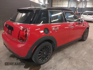 2019 MINI Hardtop 4 Door Cooper with VIN WMWXU1C57K2J02108, listed as a IAAI auction lot 42285864 with 19,383 mi miles and . Bid and sale history available at DreamBid. Image 4.