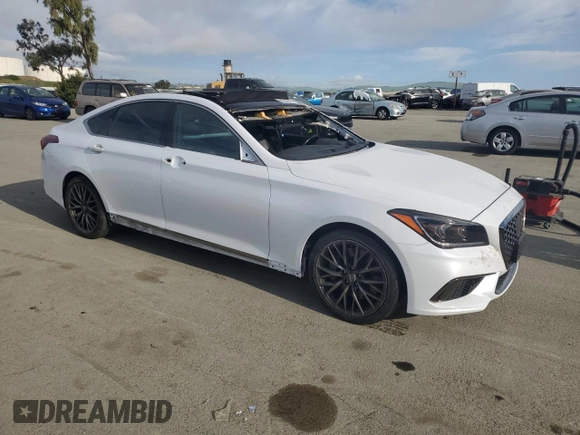 2018 Genesis G80 Sport with VIN KMHGN4JB7JU241017, listed as a Copart auction lot 52548865 with 90,560 mi miles and Salvage title. Bid and sale history available at DreamBid. Image 4.