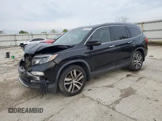 2017 Honda Pilot Touring with VIN 5FNYF5H97HB014086, listed as a Copart auction lot 55303445 with 170,284 mi miles and Salvage title. Bid and sale history available at DreamBid. Image 1.