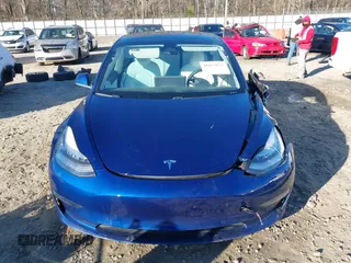 2019 Tesla Model 3 Long Range with VIN 5YJ3E1EB7KF454636, listed as a IAAI auction lot 41853972 with 56,916 mi miles. Bid and sale history available at carsss.com. Image 13.