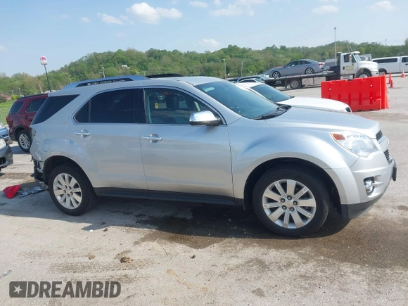 2011 Chevrolet Equinox 2LT z VIN 2CNFLNEC0B6287590, wystawiony jako IAAI lot #42123526 z przebiegiem 80 501 mil mil oraz . Historia ofert i sprzedaży dostępna na DreamBid. Obrazek 14.