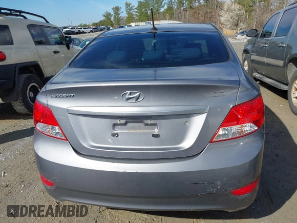 2014 Hyundai Accent GLS with VIN KMHCT4AEXEU710606, listed as a IAAI auction lot 41764163 with 103,859 mi miles. Bid and sale history available at carsss.com. Image 16.