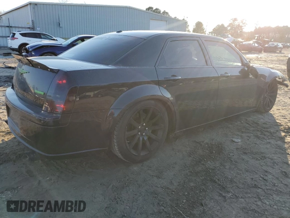 2006 Chrysler 300 C SRT8 with VIN 2C3LA73W56H450447, listed as a Copart auction lot 45502875 with 130,728 mi miles and Salvage Title. Bid and sale history available at carsss.com. Image 3.