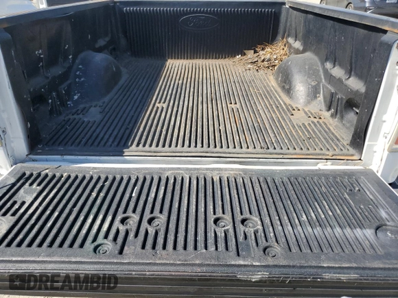 2012 Ford F-150 XL z VIN 1FTMF1EMXCFB36414, wystawiony jako Copart lot #61592065 z przebiegiem 321 291 mil mil oraz Szkoda całkowita • Salvage title. Historia ofert i sprzedaży dostępna na DreamBid. Obrazek 10.