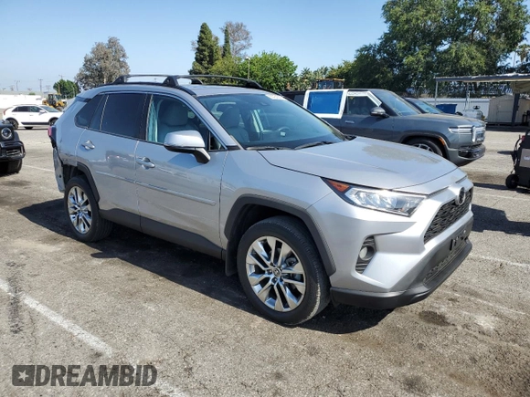 2021 Toyota RAV4 XLE Premium with VIN 2T3C1RFV4MC148429, listed as a Copart auction lot 58264395 with 26,799 mi miles and Salvage title. Bid and sale history available at DreamBid. Image 4.