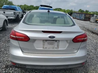2018 Ford Focus SE z VIN 1FADP3F27JL250591, wystawiony jako Copart lot #54989245 z przebiegiem 85 838 mil mil oraz Szkoda całkowita • Salvage title. Historia ofert i sprzedaży dostępna na DreamBid. Obrazek 6.