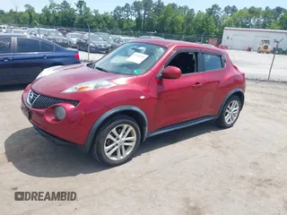2012 Nissan Juke SL z VIN JN8AF5MV5CT112550, wystawiony jako IAAI lot #42320210 z przebiegiem 146 661 mil mil oraz . Historia ofert i sprzedaży dostępna na DreamBid. Obrazek 2.