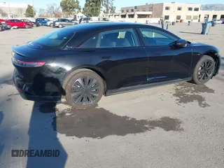 2025 Lucid Air Pure with VIN 50EA1PGA7SA004788, listed as a IAAI auction lot 41518561 with 1,872 mi miles. Bid and sale history available at carsss.com. Image 4.