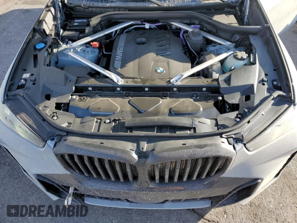 2025 BMW X5 sDrive40i with VIN 5UX13EU09S9X71671, listed as a Copart auction lot 42515055 with 2,695 mi miles and Salvage Title. Bid and sale history available at carsss.com. Image 12.