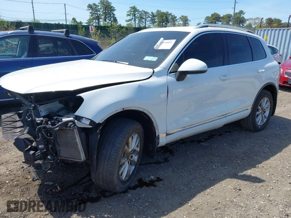 2013 Volkswagen Touareg Sport с VIN WVGEP9BP4DD013215, выставлен на аукционе IAAI как лот 42154801 с пробегом 159 556 миль миль и . История ставок и продаж доступна на DreamBid. Изображение 2.