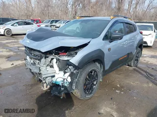 2024 Subaru Crosstrek Wilderness with VIN 4S4GUHT63R3763297, listed as a IAAI auction lot 41684783 with 16,338 mi miles. Bid and sale history available at carsss.com. Image 2.