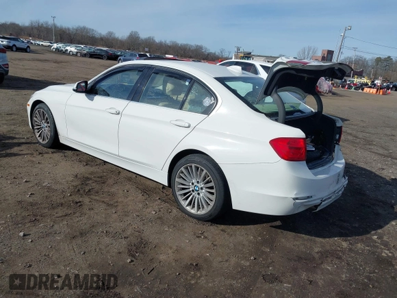 2014 BMW 3 Series 335i xDrive with VIN WBA3B9C52EJ466045, listed as a IAAI auction lot 41281384 with 136,329 mi miles. Bid and sale history available at carsss.com. Image 3.