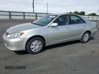 2005 Toyota Camry LE with VIN JTDBE30K453024644, listed as a Copart auction lot 62121005 with 128,055 mi miles and Salvage title. Bid and sale history available at DreamBid. Image 1.