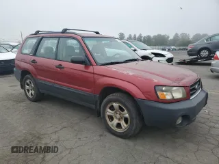 2003 Subaru Forester X with VIN JF1SG63603H744510, listed as a Copart auction lot 71309194 with 149,187 mi miles and Salvage Title. Bid and sale history available at carsss.com. Image 4.