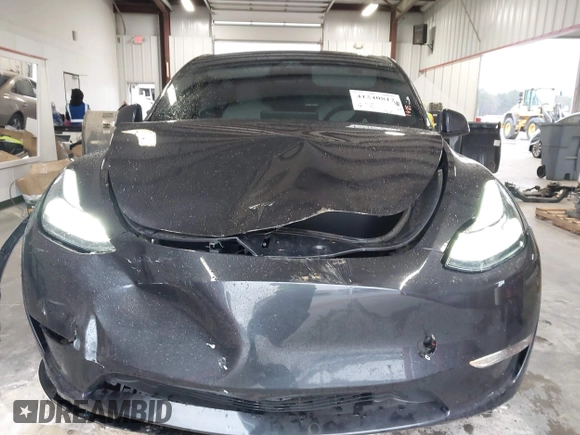 2024 Tesla Model Y Performance with VIN 7SAYGDEFXRF049338, listed as a IAAI auction lot 41240812 with 10,132 mi miles and . Bid and sale history available at DreamBid. Image 12.