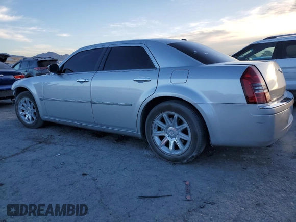 2006 Chrysler 300 C with VIN 2C3KA63H36H480201, listed as a Copart auction lot 44947715 with 145,831 mi miles and Salvage Title. Bid and sale history available at carsss.com. Image 2.