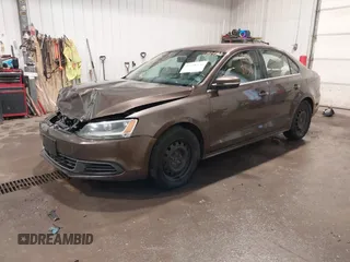 2014 Volkswagen Jetta TDI w/Premium with VIN 3VWLL7AJ1EM358214, listed as a IAAI auction lot 42148435 with 174,923 mi miles and . Bid and sale history available at DreamBid. Image 2.