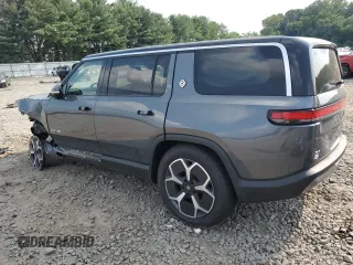 2024 Rivian R1S Adventure z VIN 7PDSGBBA0RN038679, wystawiony jako Copart lot #66486464 z przebiegiem Nie podano mil oraz Szkody całkowita. Historia ofert i sprzedaży dostępna na DreamBid. Obrazek 2.