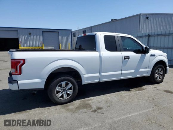 2015 Ford F-150 XL with VIN 1FTEX1CP7FKE77571, listed as a Copart auction lot 58248885 with 308,931 mi miles and Clean title. Bid and sale history available at DreamBid. Image 3.